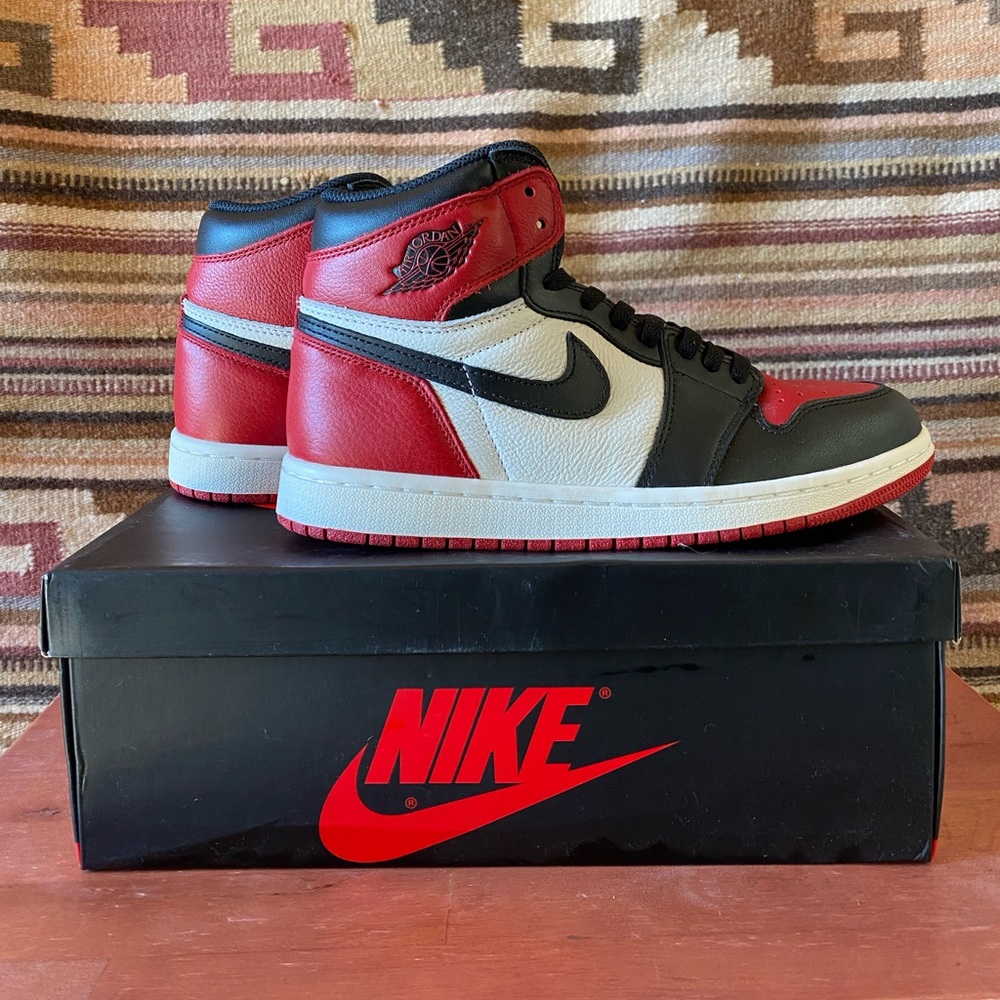 Nike Air Force One sneaker. Black, red and white